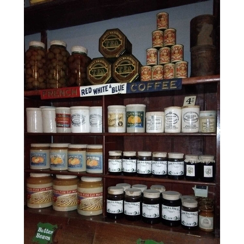 357 - ± Birch, Birch & Co Grocers Tins, Jars and a shelf advert Numerous tins and jars, nearly all empty (... 