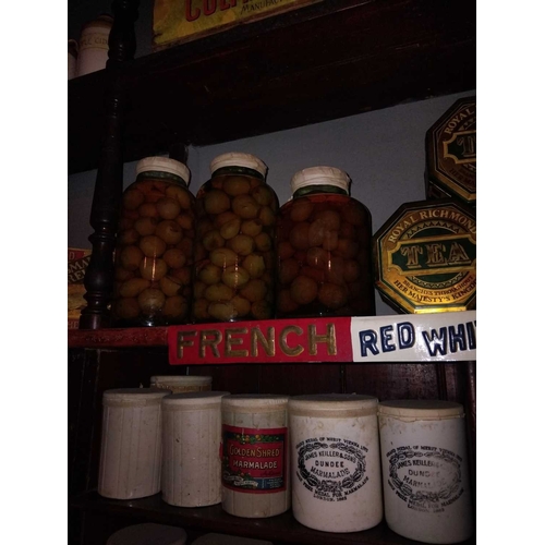 357 - ± Birch, Birch & Co Grocers Tins, Jars and a shelf advert Numerous tins and jars, nearly all empty (... 