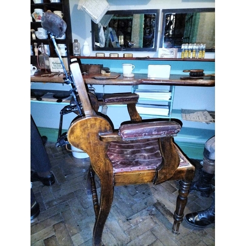 372 - ± E Thomas Gentleman's Hairdresser Pair of Barber's Beech and Leather Ogee patent Chairs Pair of Bar... 