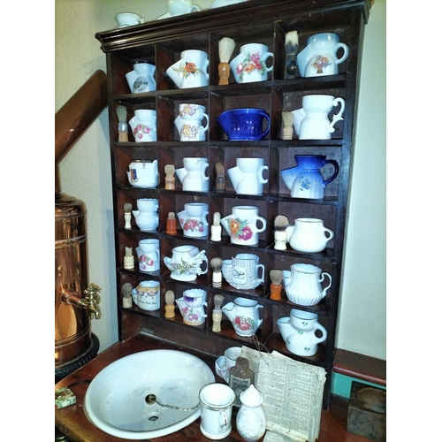 379 - ± E Thomas Gentleman's Hairdresser Collection of shaving mugs etc A collection of shaving mugs and r... 