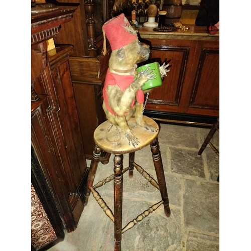 426 - ± The Pheasant Inn A 19th century taxidermy monkey 50cm dressed in Ottoman style clothing with embro... 