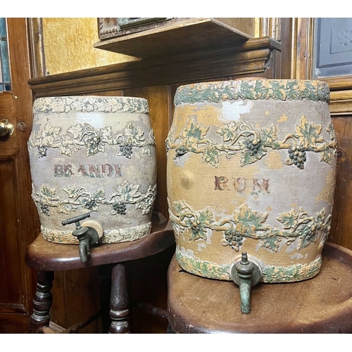 429 - ± The Pheasant Inn Stoneware barrels A pair by James Stiff Lambeth with sprigged-on decoration one p... 