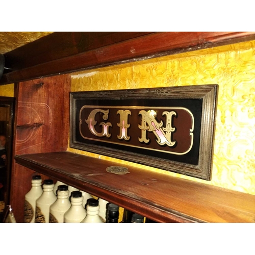 441 - ± The Pheasant Inn A mirror and signs Two verre eglomise framed ‘Gin’ and ‘Rum’ bar advertising sign... 