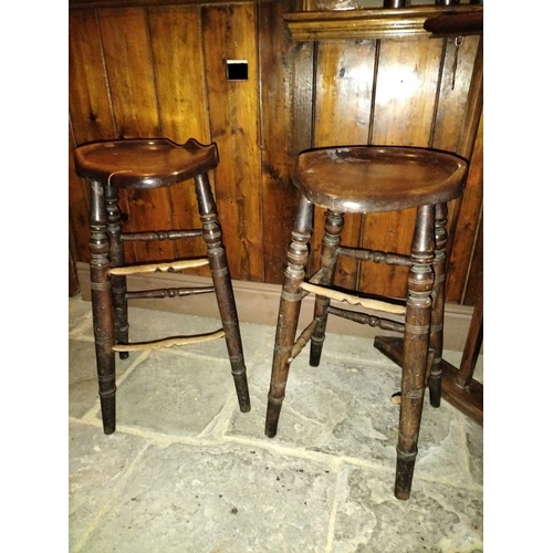 445 - ± The Pheasant Inn A pair of stools A pair of 19th century stools with saddle seats H 68cm - This lo... 