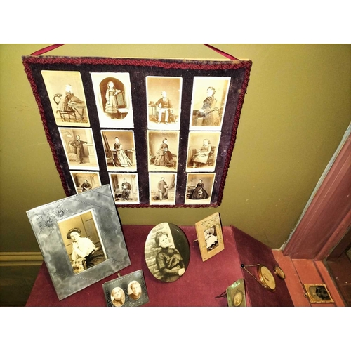 462 - ± Maggs Photographer Display of framed portraits The right-hand shop window display of framed portra... 