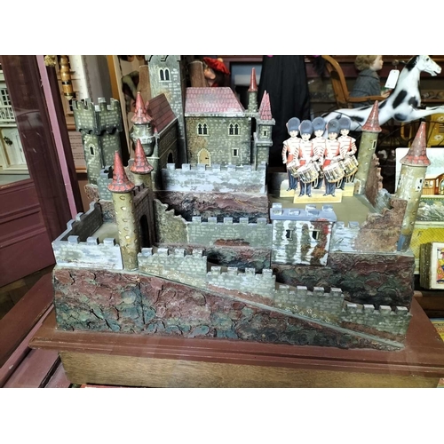 477 - ± Mr Neville's Toyshop Painted toy castle / diorama A painted wood castle toy/diorama setting 60 cm ... 