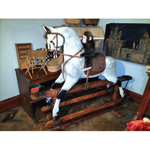 484 - ± Mr Neville's Toyshop A good large carved and painted Rocking Horse A large good early C20th carved... 