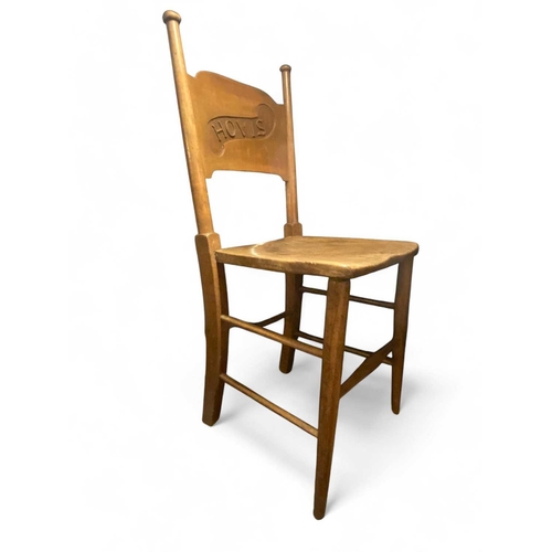 526 - ± The Bakery An unuasial chair with 'Hovis' carved into the back Height 94cm, seat: 36x36cm - This l... 