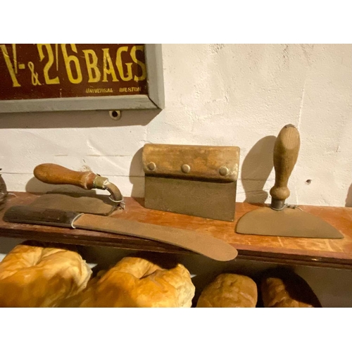 527 - ± The Bakery Baker's paddles, bread scales, shovel and other tools The baker's wooden & metal paddle... 