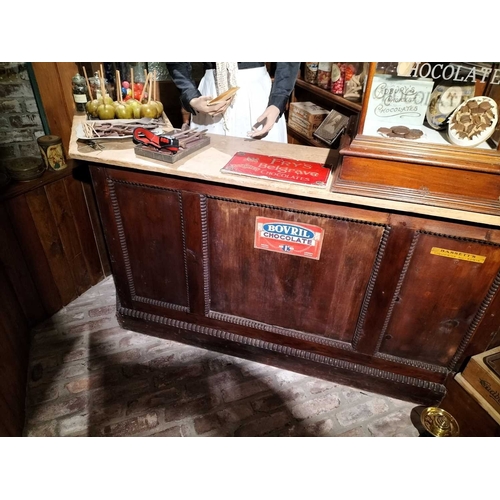 551 - ± Miss Vaughton's Sweet Shop Shop pine counter An old shop counter with pine top and panelled base, ... 