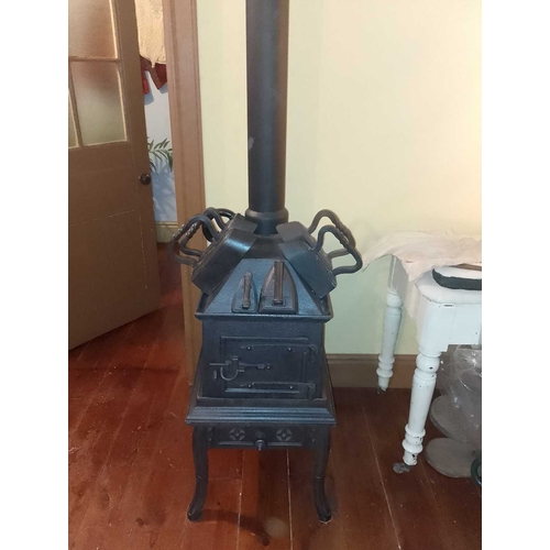 568 - ± K Fillingham Milliners Workshop Laundry Stove and irons The Carron style stove HxWxD 84x43x59 excl... 