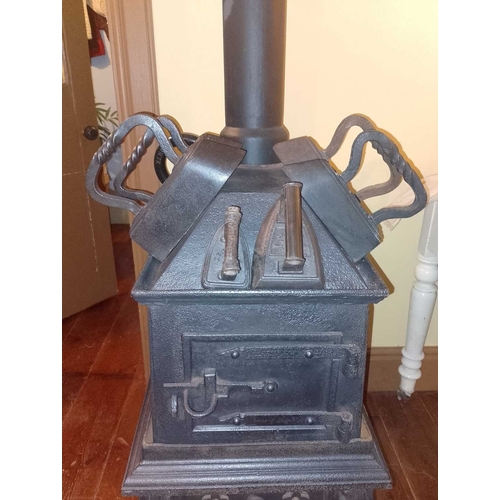 568 - ± K Fillingham Milliners Workshop Laundry Stove and irons The Carron style stove HxWxD 84x43x59 excl... 