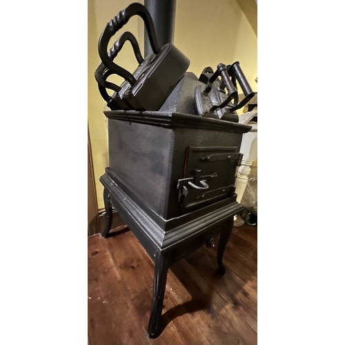 568 - ± K Fillingham Milliners Workshop Laundry Stove and irons The Carron style stove HxWxD 84x43x59 excl... 