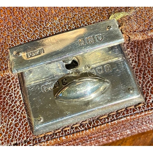 586 - ± K Fillingham Milliners A leather purse with silver mounts, a 'relay system' telephone and shop's c... 