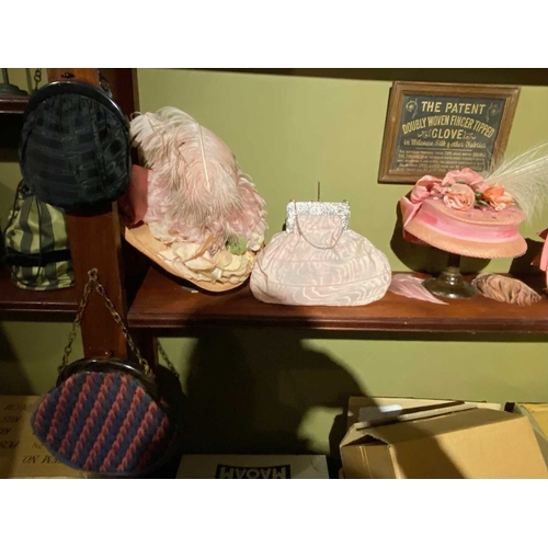 588 - ± K Fillingham Milliners Shop stock, hats, gloves etc Contents of central arched display behind coun... 