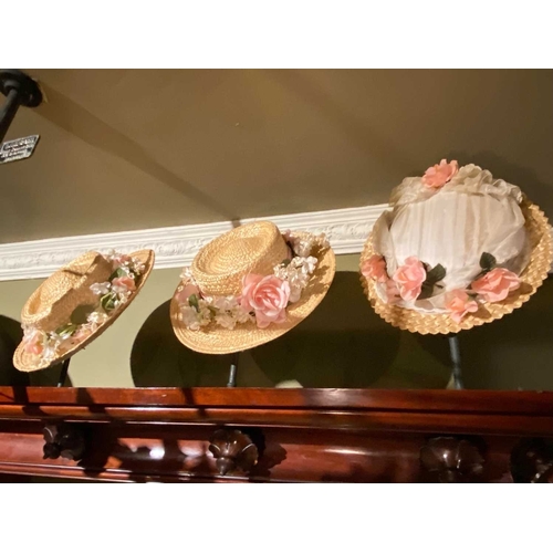 591 - ± K Fillingham Milliners Trimmed straw hats Seven trimmed straw hats above the top of the rear count... 