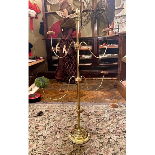 598 - ± K Fillingham Milliners A brass hat display stand With central brass pole with six adjustable arms ... 