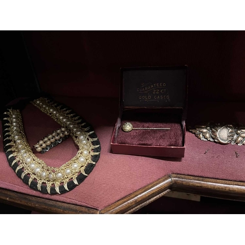 612 - ± Dotter's Jewellers & Opticians A shelf including Victorian and later jewels. To include a four pai... 