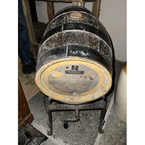 628 - ± Lugg's Hardware Store Barrels and Jars A large stoneware barrel 52cm on pine stand and a stoneware... 