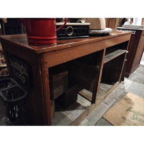 653 - ± Lugg,s Hardware Shop Counters and enamel advertising signs A mahogany topped and pine panelled cou... 