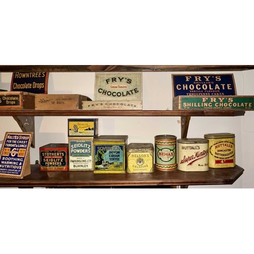 665 - ± Lugg's Hardware Shop Signs Tins Boxes etc. A collection on two long shelves - This lot will be sub... 