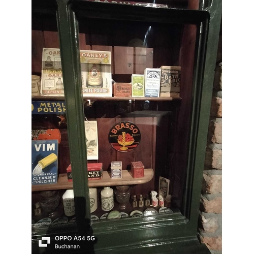 670 - ± Lugg's Hardware Store Shop window display packaging and advertising pieces A shop window display o... 