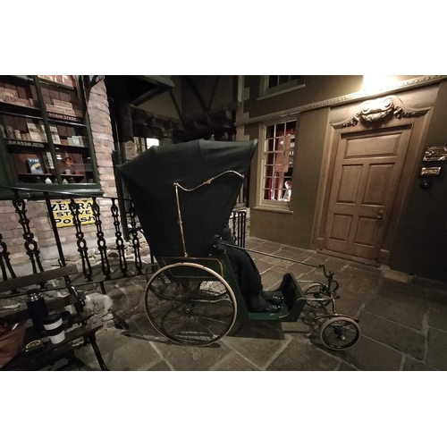 688 - ± Lugg's Hardware Shop Foot and Son's Invalid Carriage A 19th Century Invalid Carriage by J Foot and... 