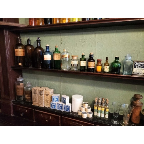 720 - ± J Dyke Apothecary Four well-filled Shelves two bottles with white glass labels 28cm, a run of gilt... 