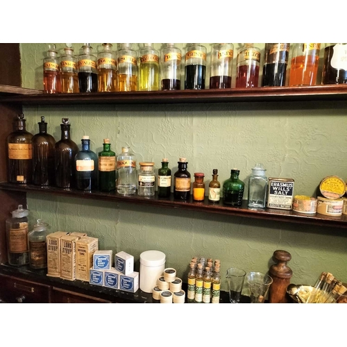 720 - ± J Dyke Apothecary Four well-filled Shelves two bottles with white glass labels 28cm, a run of gilt... 