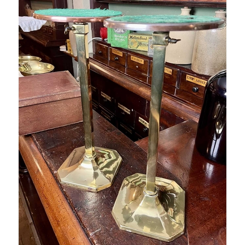 732 - ± J Dyke Apothecary Stands A pair of adjustable brass stands with iron-weighted bases 78cm maximum -... 