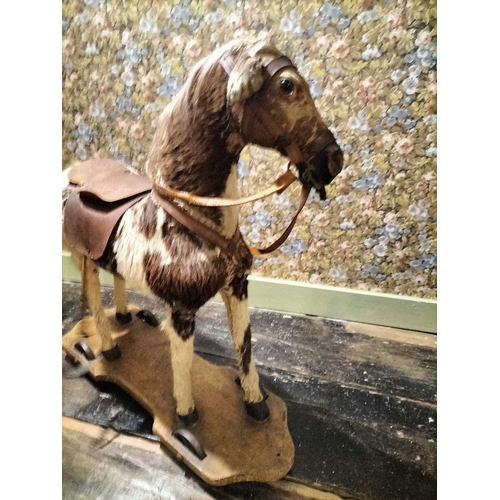 736 - ± Bakers Nursery Victorian wheeled pull along toy horse A late C19th pull along toy horse with natur... 