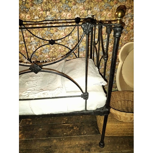 741 - ± Bakers Nursery Child's Cot brass and iron A late C19th Brass and Iron infants bed with some linen ... 