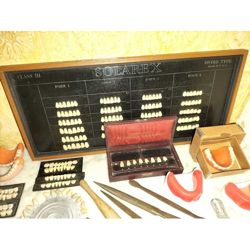 747 - ± Eli Reuben Dentist Bronze denture moulds and related items A large group of denture mould related ... 