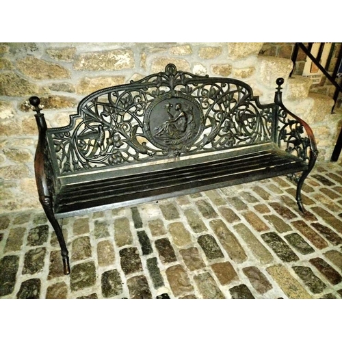 770 - ± Flambards Hotel and Coach House Cast iron bench An elaborate C20th cast iron bench. 183 cm wide x ... 