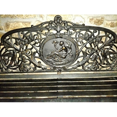 770 - ± Flambards Hotel and Coach House Cast iron bench An elaborate C20th cast iron bench. 183 cm wide x ... 