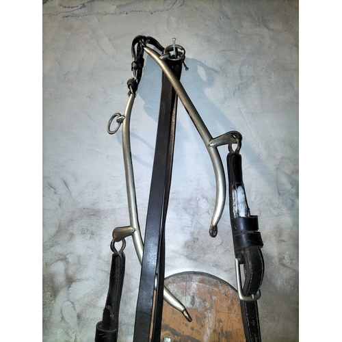 781 - ± Flambards Hotel and Coach House Leather horse tack collection All the leather horse tack hanging f... 