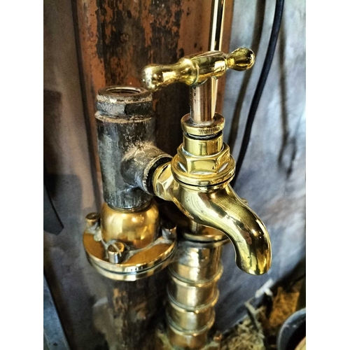 783 - ± Flambards Hotel and Coach House Brass water pump A good brass and iron wall mounted 19th century w... 