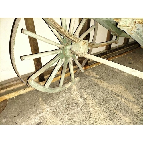 786 - ± Flambards Hotel and Coach House A painted hand cart , plough and pram. An old faded & patinated gr... 