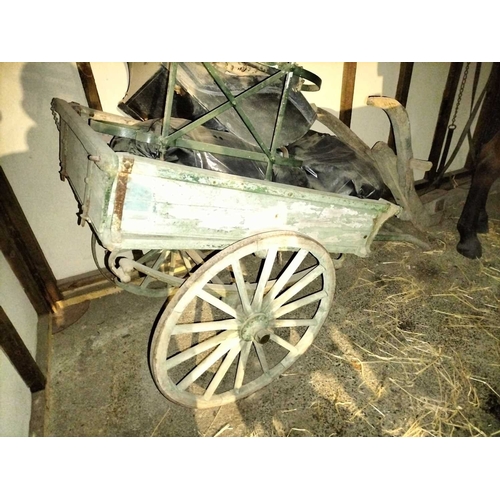 786 - ± Flambards Hotel and Coach House A painted hand cart , plough and pram. An old faded & patinated gr... 