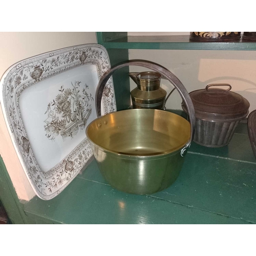 823 - ± Flambards Hotel Kitchen Two shelves of ceramics and kitchenalia A massive pewter warming meat stan... 