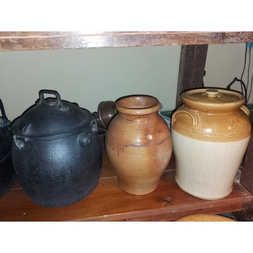 828 - ± Flambards Hotel Kitchen Cooking equipment Cast iron pots, stoneware storage jars and further items... 