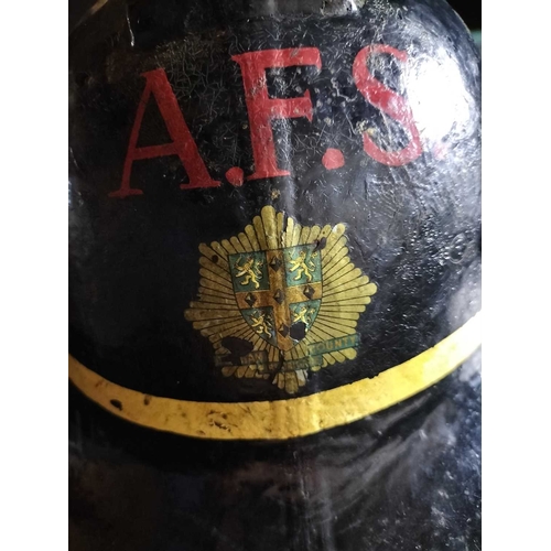 843 - ± Britain in the Blitz AFS fireman's helmet An AFS fireman's helmet Circa 1940[ Auxiliary Fire Servi... 