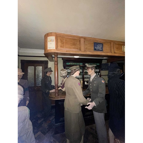 878 - ± Britain in the Blitz - Architecture Pub Bar with Canopy A Pub bar with turned & carved hardwood pi... 