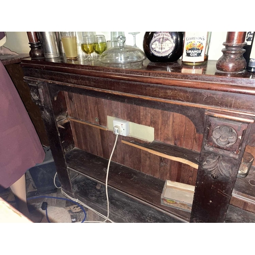 882 - ± Britain in the Blitz Mirrored Bar Back with Glass Signage A mirrored bar back with carved elements... 