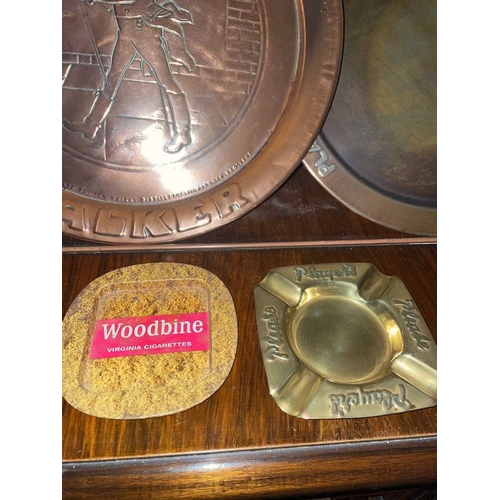 884 - ± Britain in the Blitz Pub Trays & Ashtrays 3 advertising pub trays & 2 ashtrays. A copper Johnnie W... 