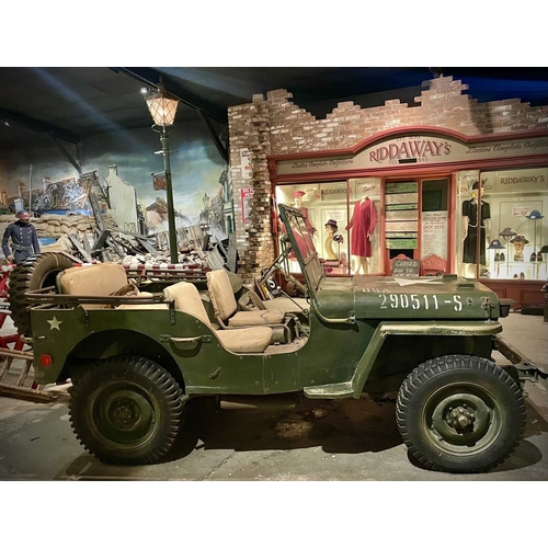 891 - ± Britain in the Blitz Willys MB Jeep A World War II period Willys MB Military Jeep with rear canvas... 