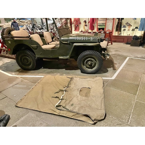 891 - ± Britain in the Blitz Willys MB Jeep A World War II period Willys MB Military Jeep with rear canvas... 