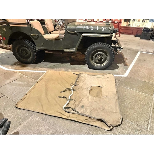 891 - ± Britain in the Blitz Willys MB Jeep A World War II period Willys MB Military Jeep with rear canvas... 