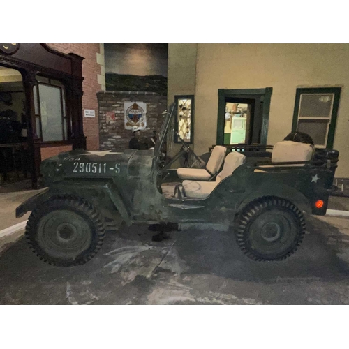 891 - ± Britain in the Blitz Willys MB Jeep A World War II period Willys MB Military Jeep with rear canvas... 