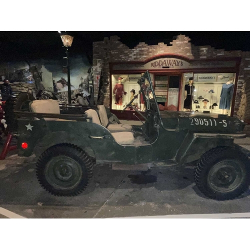 891 - ± Britain in the Blitz Willys MB Jeep A World War II period Willys MB Military Jeep with rear canvas... 